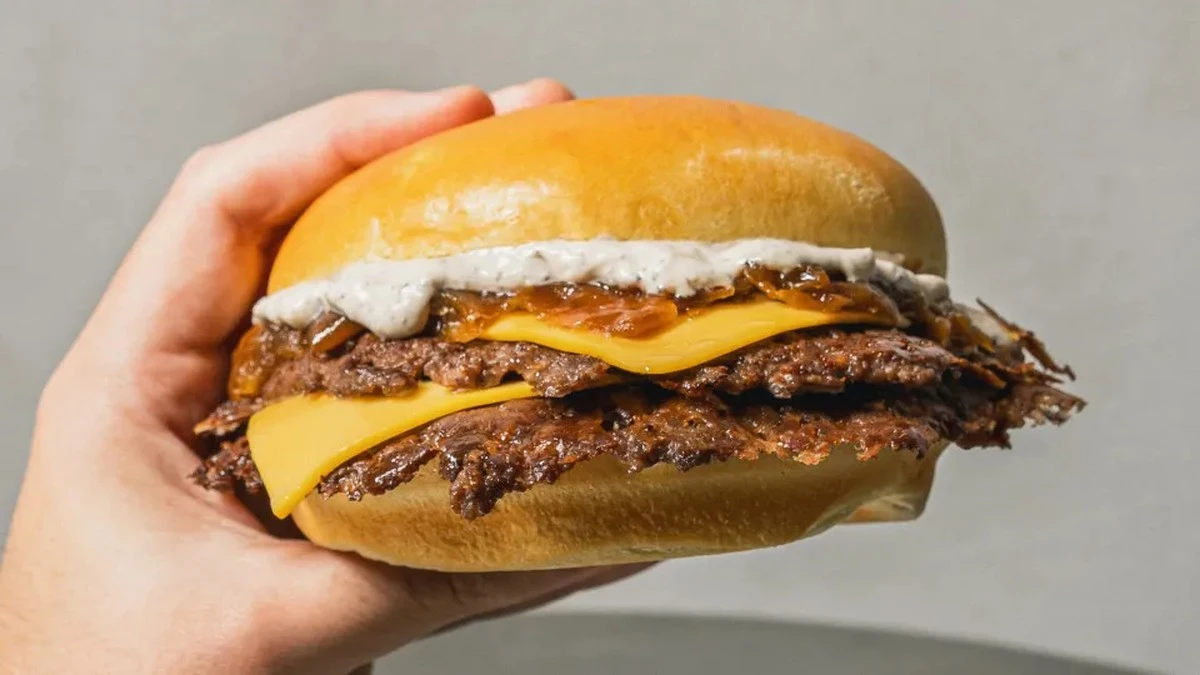 Waarom ervaren foodies deze week massaal voor de truffelsaus bij de burgerketens kiezen