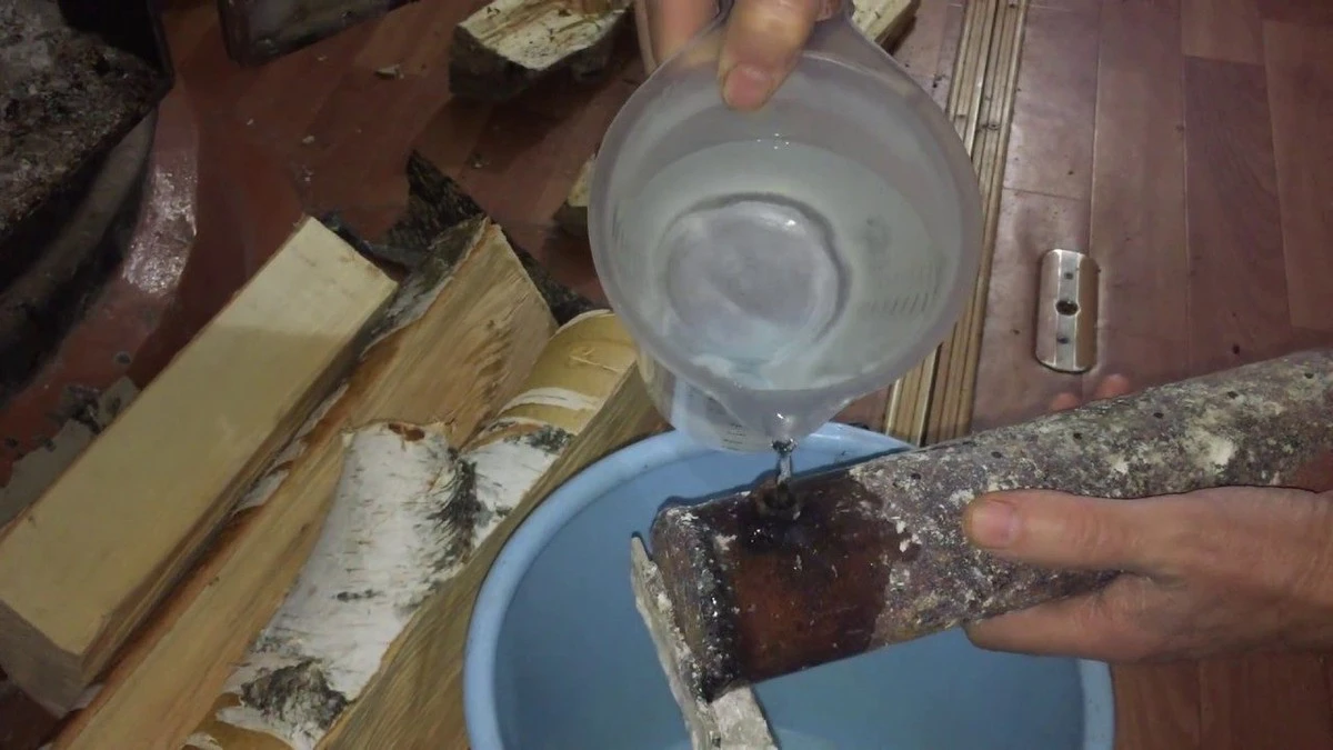 Waarom slimme stokers deze winter een metalen buis tussen het brandhout leggen